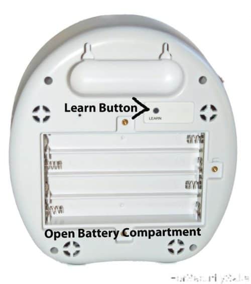 Electronic Barking Dog Alarm Back With Open Battery Compartment And Learn Button
