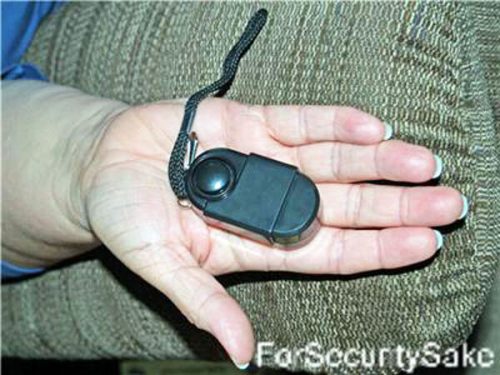 Personal Safety And PIR Travel Alarm Closed In Hand