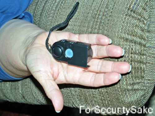 Personal Safety And PIR Travel Alarm Open in Hand
